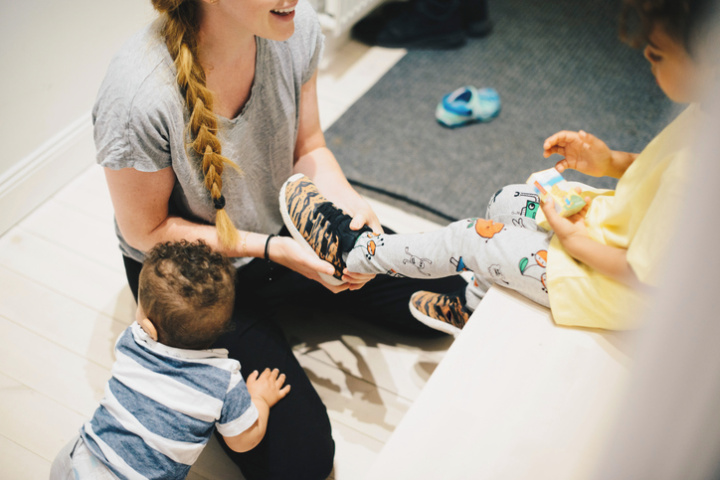 a family with a baby and a toddler