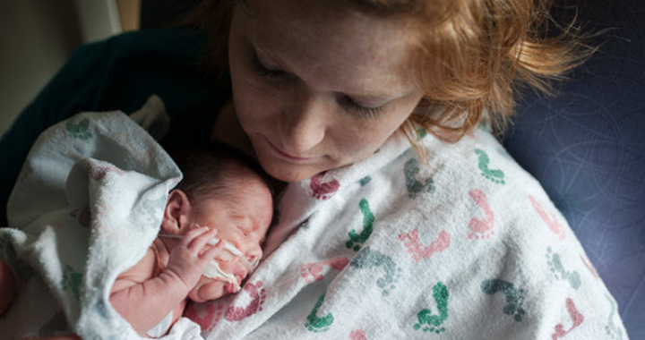 Tired mother and baby